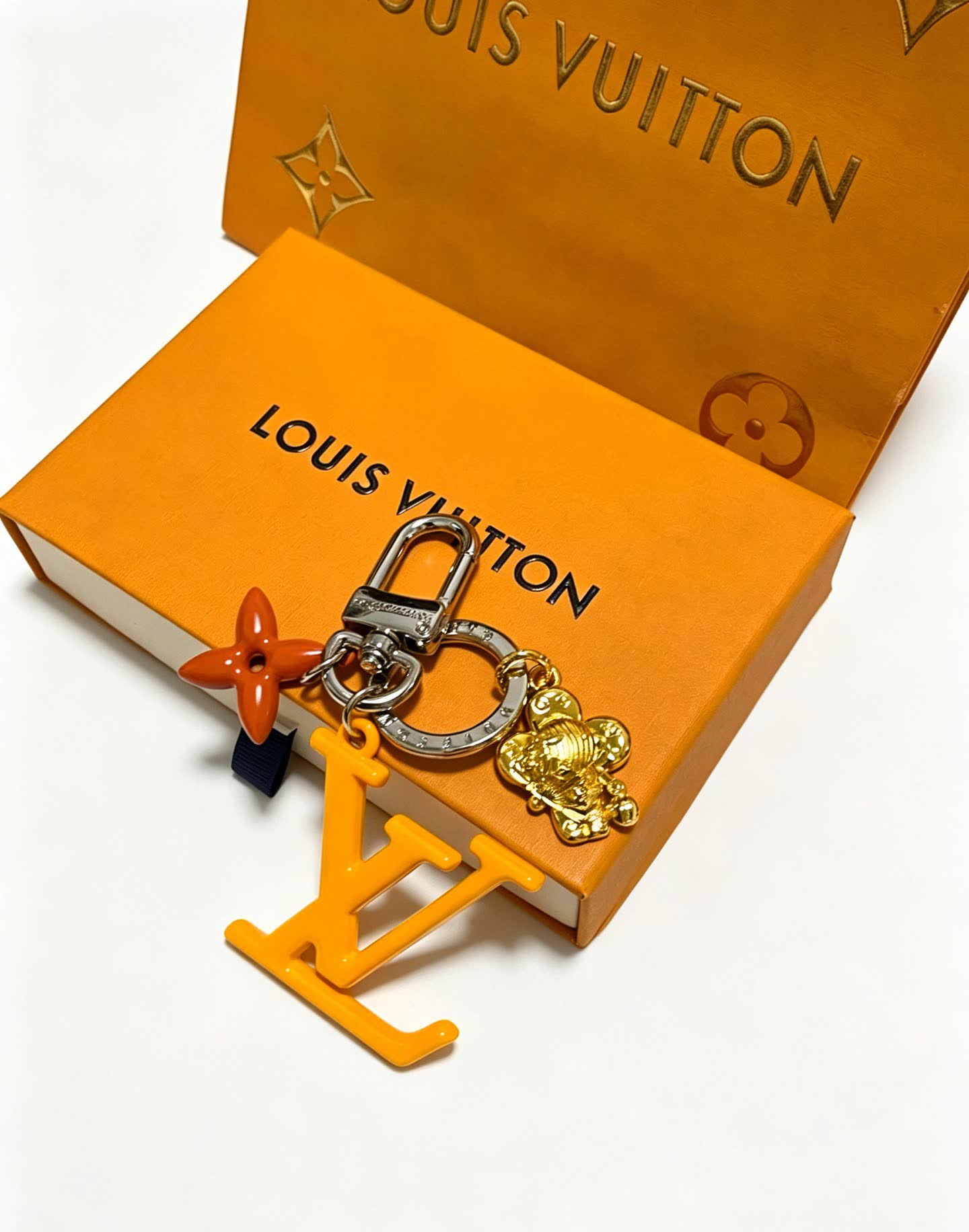 Louis Vuitton Keychain with LV Logo and Monogram Motif